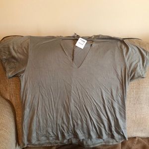 Nice NWT green cut out shirt.